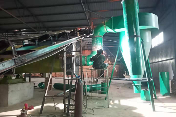 Dust collector for fertilizer drying